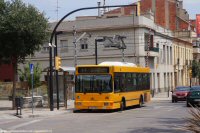 Coche 6 en la L1. Paso a nivel junto a la estación RENFE, ago.2014